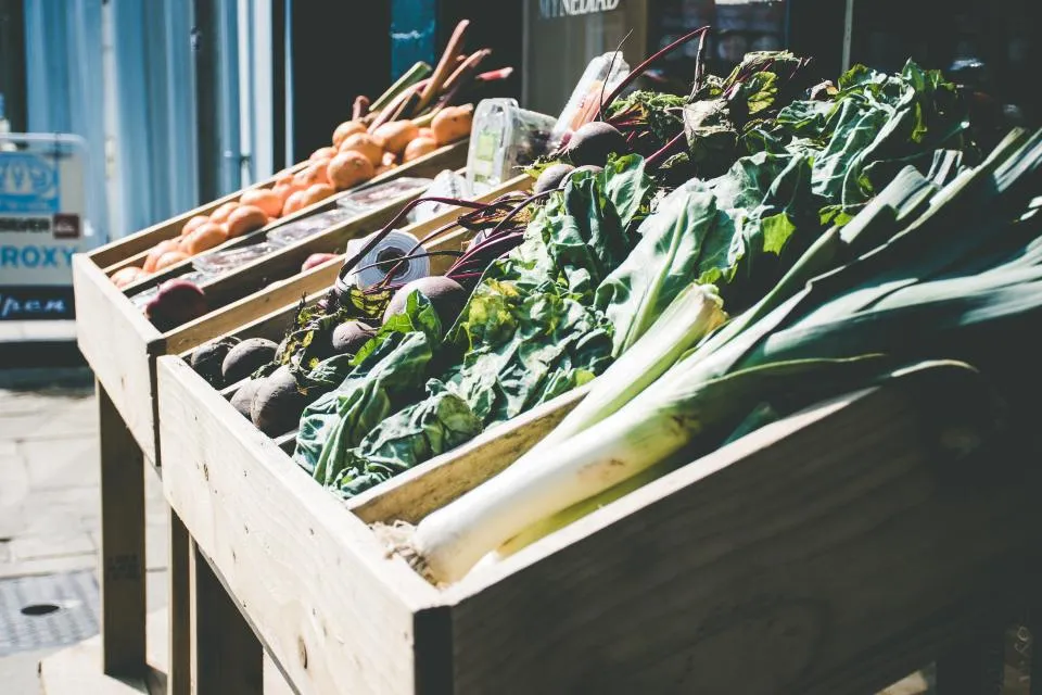 Crates of fresh produce stacked for distribution