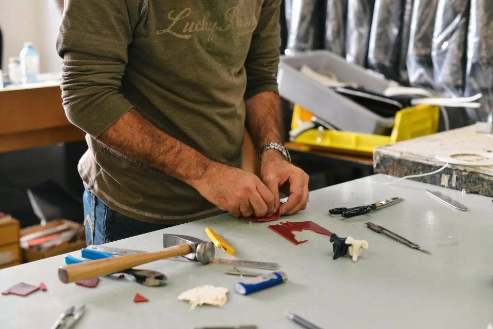 Hand tools laid out on a workbench
