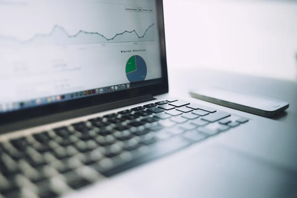 Laptop screen showing a growth chart