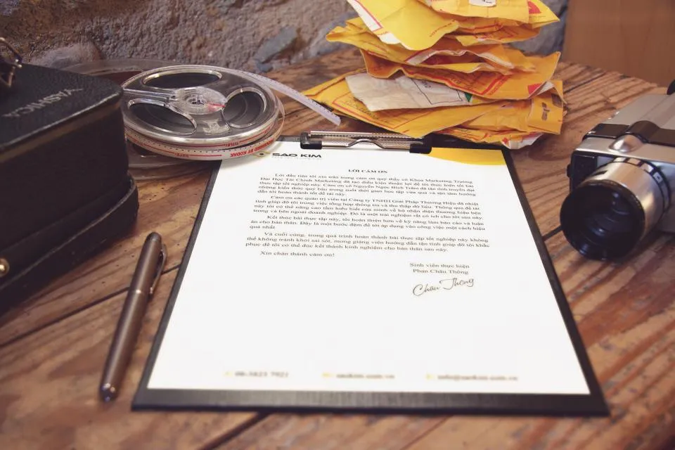 Printed document on a clipboard on a work desk