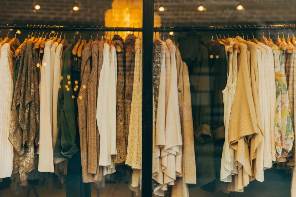 Clothing on hangers in a retail store